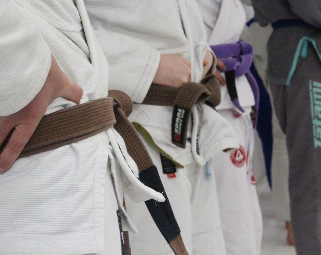 Gi Class - Coach is showing a technique